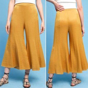 Anthropologie Metallic golden yellow flared capri